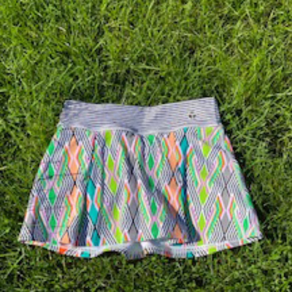 TRINA TURK NEON LIGHTS PlLEATED TENNIS SKIRT